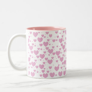 Caneca cor-de-rosa dos corações