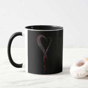 Caneca Coração sangrando. Um coração triste ferido. Escur