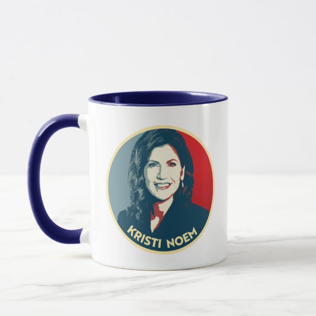 Caneca Crachá de Propaganda KRISTI NOEM (Esquerda)