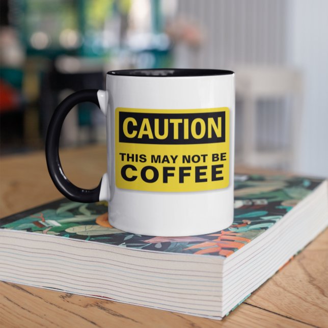 Caneca Cuidado: Isto Pode Não Ser Nenhuma Bebida (Criador carregado)
