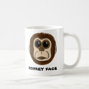 Caneca da cara do macaco