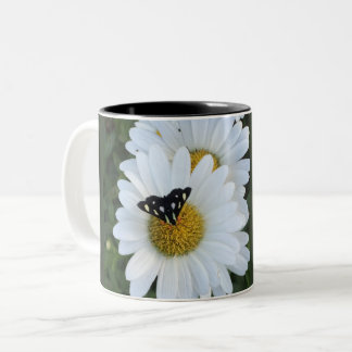 Caneca da flor da margarida