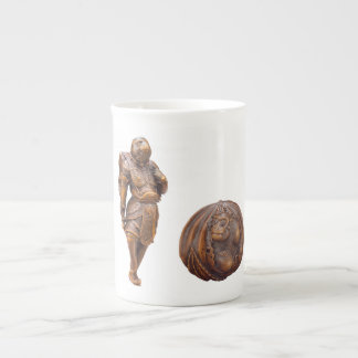Caneca da porcelana de Netsuke do macaco
