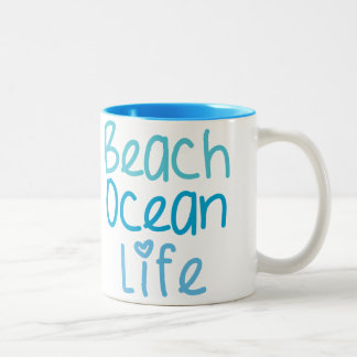 Caneca da vida do oceano da praia