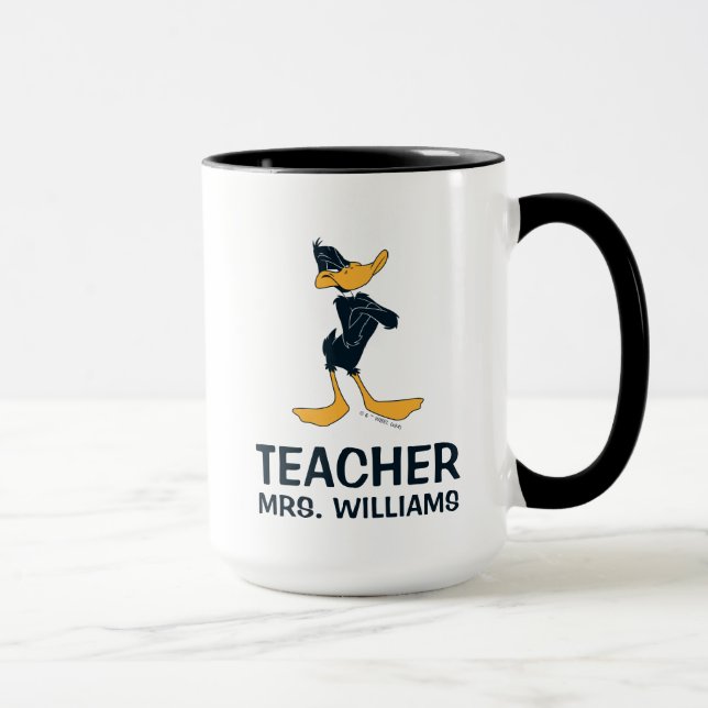 Caneca DAFFY DUCK™ com professor cruzado de armas (Direita)