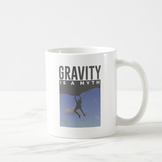 Caneca De Café A gravidade é uma escalada da parede da rocha do (Direita)