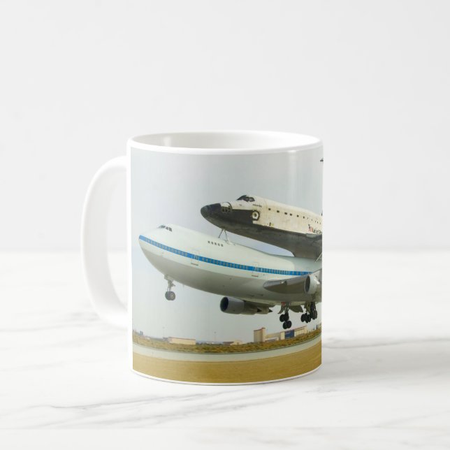 CANECA DE CAFÉ AERONAVES DA TRANSPORTADORA DE NAVIOS (Frente Esquerda)