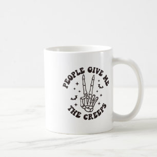 Caneca De Café As pessoas Me Dão O Halloween Da Mão Do Esqueleto