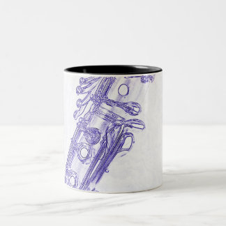 Caneca de café azul do desenho do clarinete