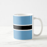 Caneca De Café Bandeira Cerâmica do Botsuana<br><div class="desc">Celebrar a beleza e o espírito do Botswana com esta elegante caneca cerâmica de Bandeira do Botswana. Apresentando o icônico campo azul-claro com uma faixa negra delimitada pelo branco, esta caneca é um tributo perfeito à rica cultura, história e maravilhas naturais do Botsuana. Ideal para aproveitar seu café matinal, chá...</div>