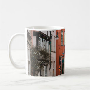 CANECA DE CAFÉ BICICLETA BRANCA ESTACIONADA NA ESTRADA