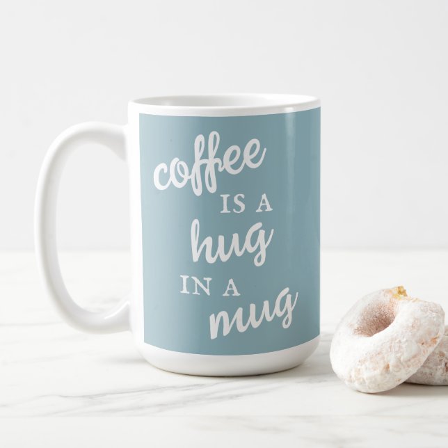 Caneca De Café Café é abraço numa caneca azul mudada (Com Donut)