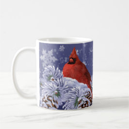 Caneca De Café Cardeal vermelho aninhado sobre neve coberta de po
