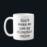 Caneca De Café Citação de Humor Diretor do Teatro Funny<br><div class="desc">Esta caneca divertida apresenta uma citação humorística divertida para os diretores - Não me faça usar minha voz diretora - em uma simples tipografia de máquina de escrever em preto e branco. A palavra diretor pode ser personalizada. ideia de presente de excelente!</div>