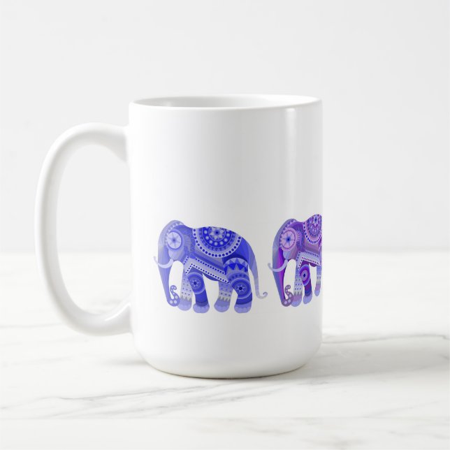 CANECA DE CAFÉ COM ELEFANTES AZUIS REFRESCANTES (Esquerda)
