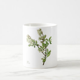 Caneca de café com flor de mirtilo