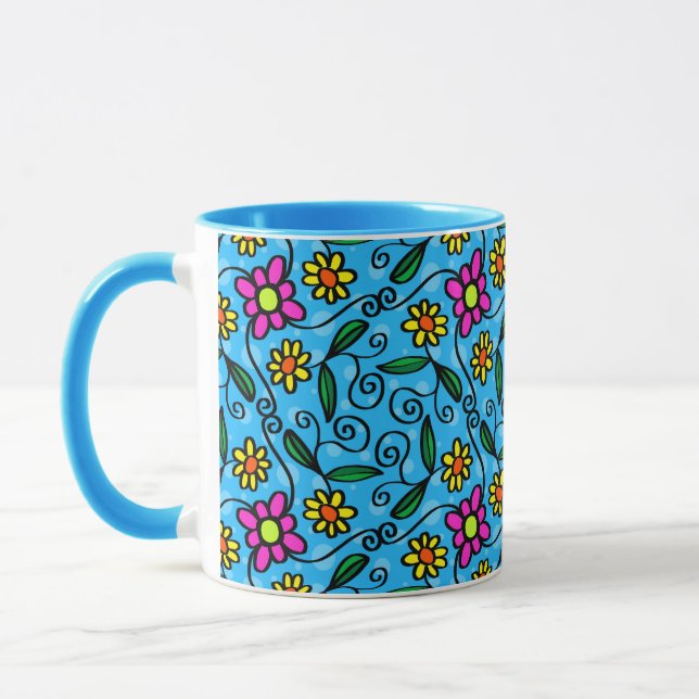 caneca de café com flores rabiscadas (Esquerda)