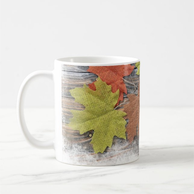 Caneca de café com folhas espalhadas (Esquerda)