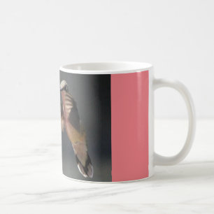 caneca de café com resto do colibri…