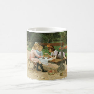 Caneca De Café Crianças tendo chá à tarde no parque