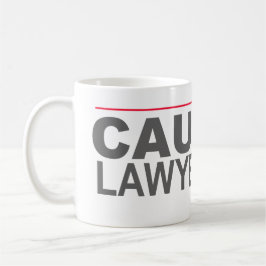 CANECA DE CAFÉ "CUIDADO LAWYERED ACIMA" --