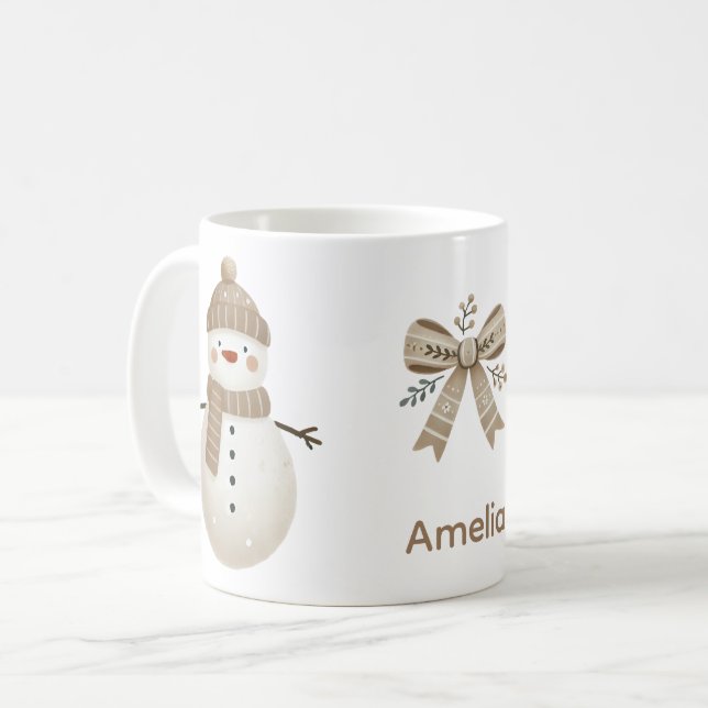 Caneca De Café Desenho de Nome de Boneco de Neve Fofo com Laço de (Frente Esquerda)