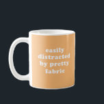 Caneca De Café Distraído pela citação do Quilter Funny do Tecido<br><div class="desc">Uma camiseta humorística engraçada para colchetes,  torres e qualquer um que seja facilmente distraído por um tecido bonito.</div>