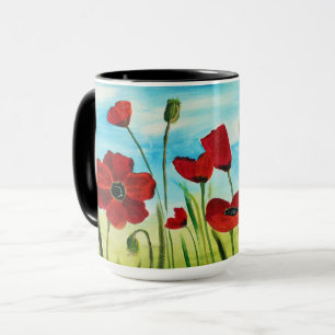 Caneca de café do campo da papoila