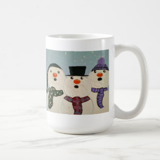 Caneca de café dos bonecos de neve