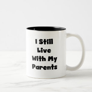 Caneca De Café Em Dois Tons Ainda viva com os pais