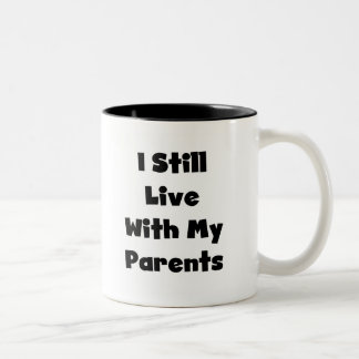 Caneca De Café Em Dois Tons Ainda viva com os pais