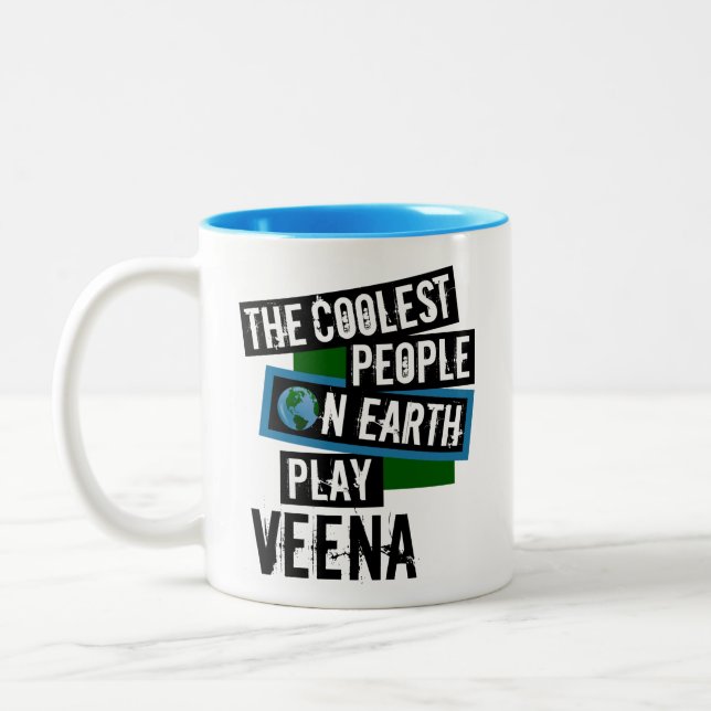 Caneca De Café Em Dois Tons As Pessoas mais legais da Terra Tocam Veena (Esquerda)