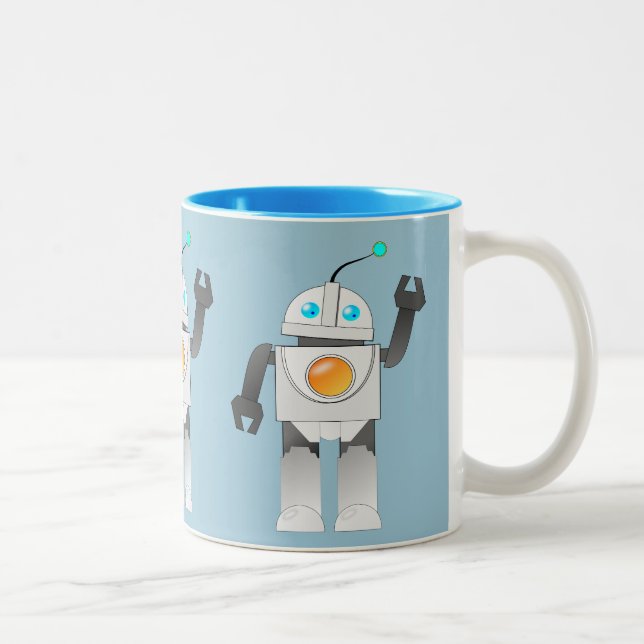 CANECA DE CAFÉ EM DOIS TONS BRINQUEDOS DE ROBÔ EM FUNDO AZUL (Direita)