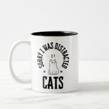 Desculpe, fui distraído pelos botões de gatos