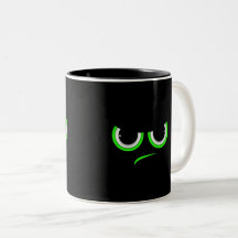 Design de rosto zangado engraçado com olhos verdes