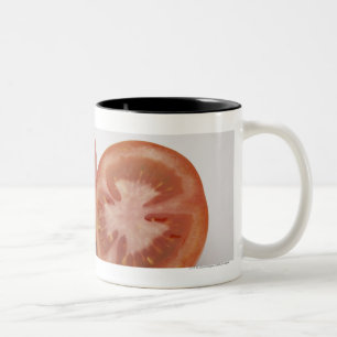 Caneca De Café Em Dois Tons Fim-acima de dois tomates