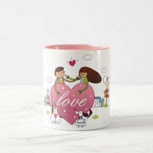 Caneca De Café Em Dois Tons Fim-acima de um casal que guardara uma forma do