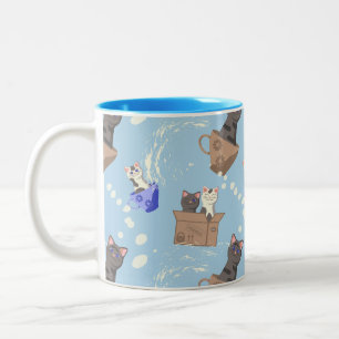 Caneca De Café Em Dois Tons Gatos na caixa e leite cai em azul