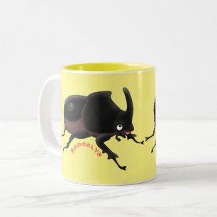Caneca De Café Em Dois Tons Imagem do desenho animado do besouro da rinoceront