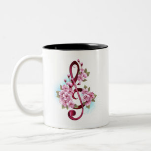 Caneca De Café Em Dois Tons Notas de clave de trecho musical com flores de Sak