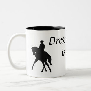 Caneca De Café Em Dois Tons O adestramento é um copo da dança
