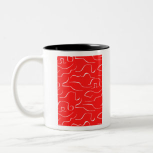 Caneca De Café Em Dois Tons O padrão vermelho e branco.