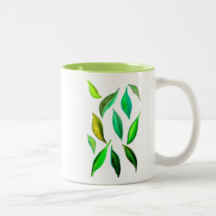 Caneca De Café Em Dois Tons O verde deixa a aguarela ambiental