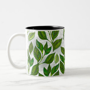 Caneca De Café Em Dois Tons Padrão contínuo com folhas de chá verde