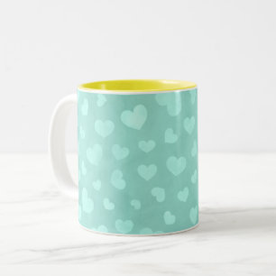 Caneca De Café Em Dois Tons Verde com corações brancos e interior amarelo