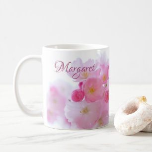 Caneca de café floral com flor de cerejeira rosa