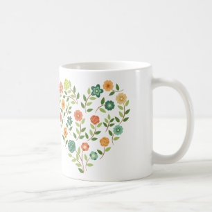 Caneca de café floral do coração