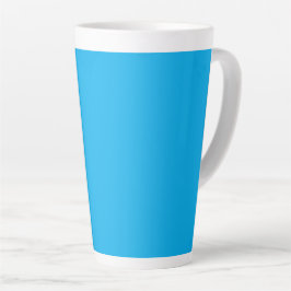 Caneca De Café Latte Um fundo azul sólido vibrante preenche o quadro