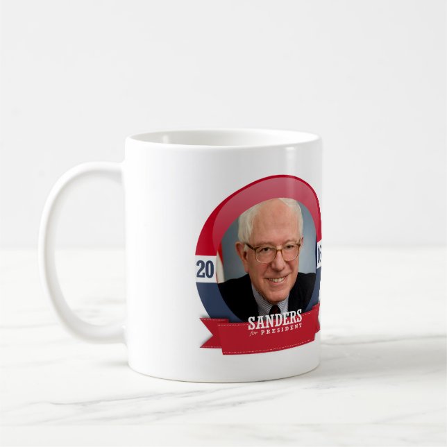 CANECA DE CAFÉ MÁQUINAS DE LIXAR 2016 DE BERNIE (Esquerda)