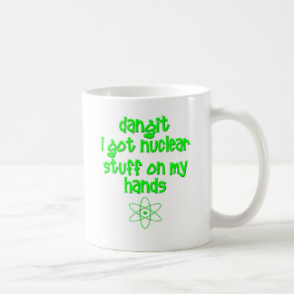 Caneca De Café Material nuclear nas mãos
